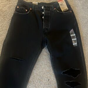 Levi’s 501 original style distressed women’s jeans